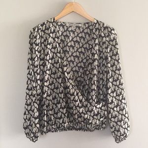Faux wrap, patterned top.